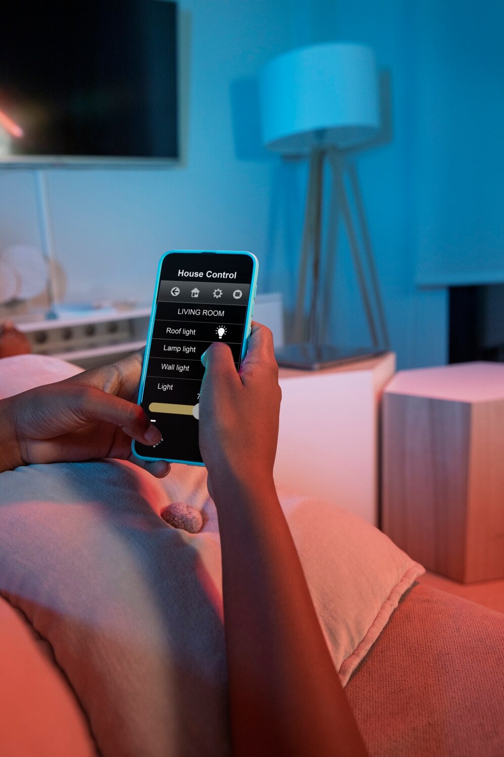 hand-holding-smartphone-home_23-2150639966